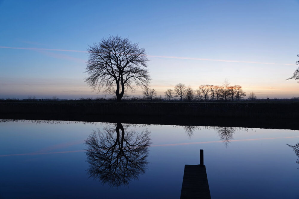 Rand van de Onlanden bij zonsondergang